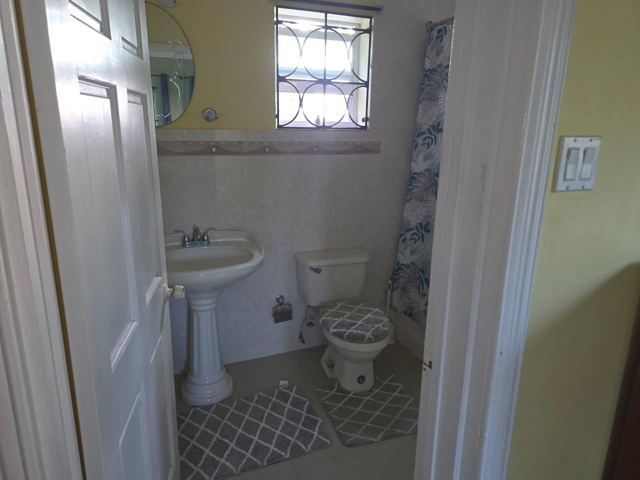 Seventh image of A202- Palm Close Rose Hall in SPOT VALLEY, St. James, Jamaica - property is For Rent