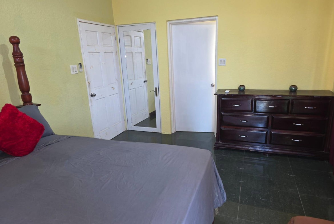 Fifth image of B206- Palm Close Rose Hall in SPOT VALLEY, St. James, Jamaica - property is For Rent