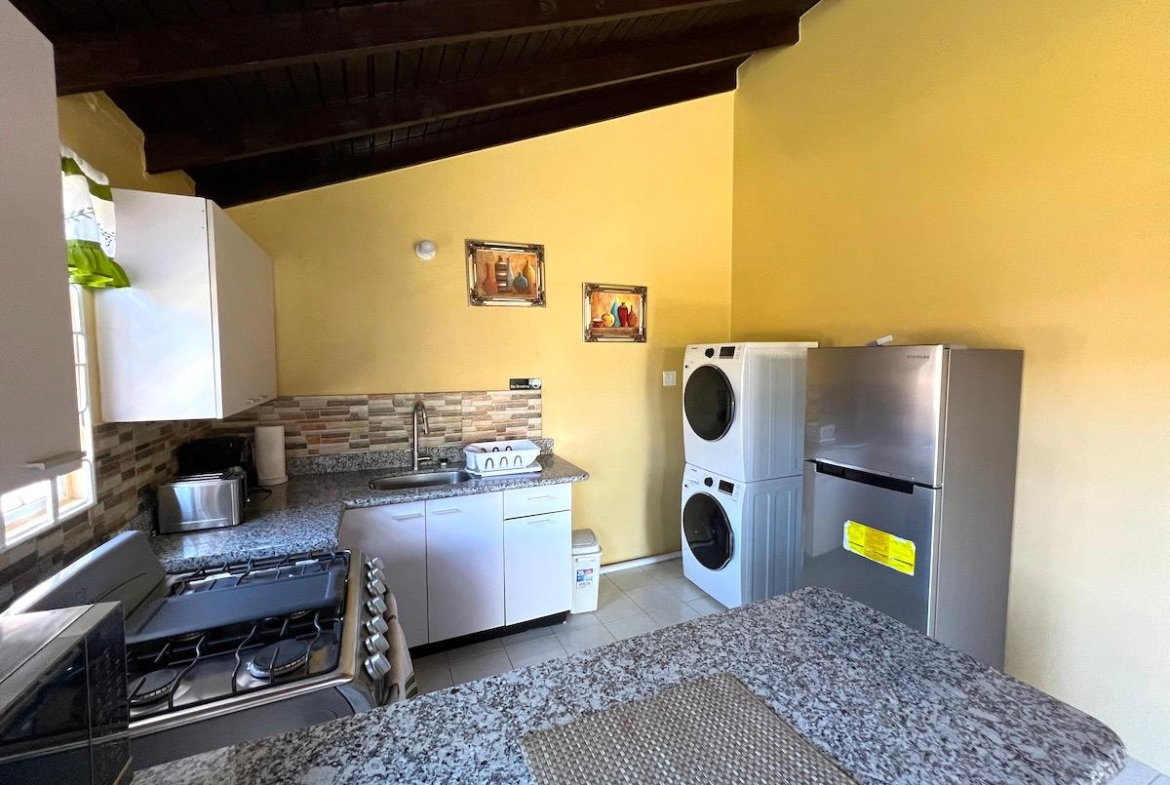 Sixth image of 459b South View Dr, Rhyne Park in Rose Hall, St. James, Jamaica - property is For Rent