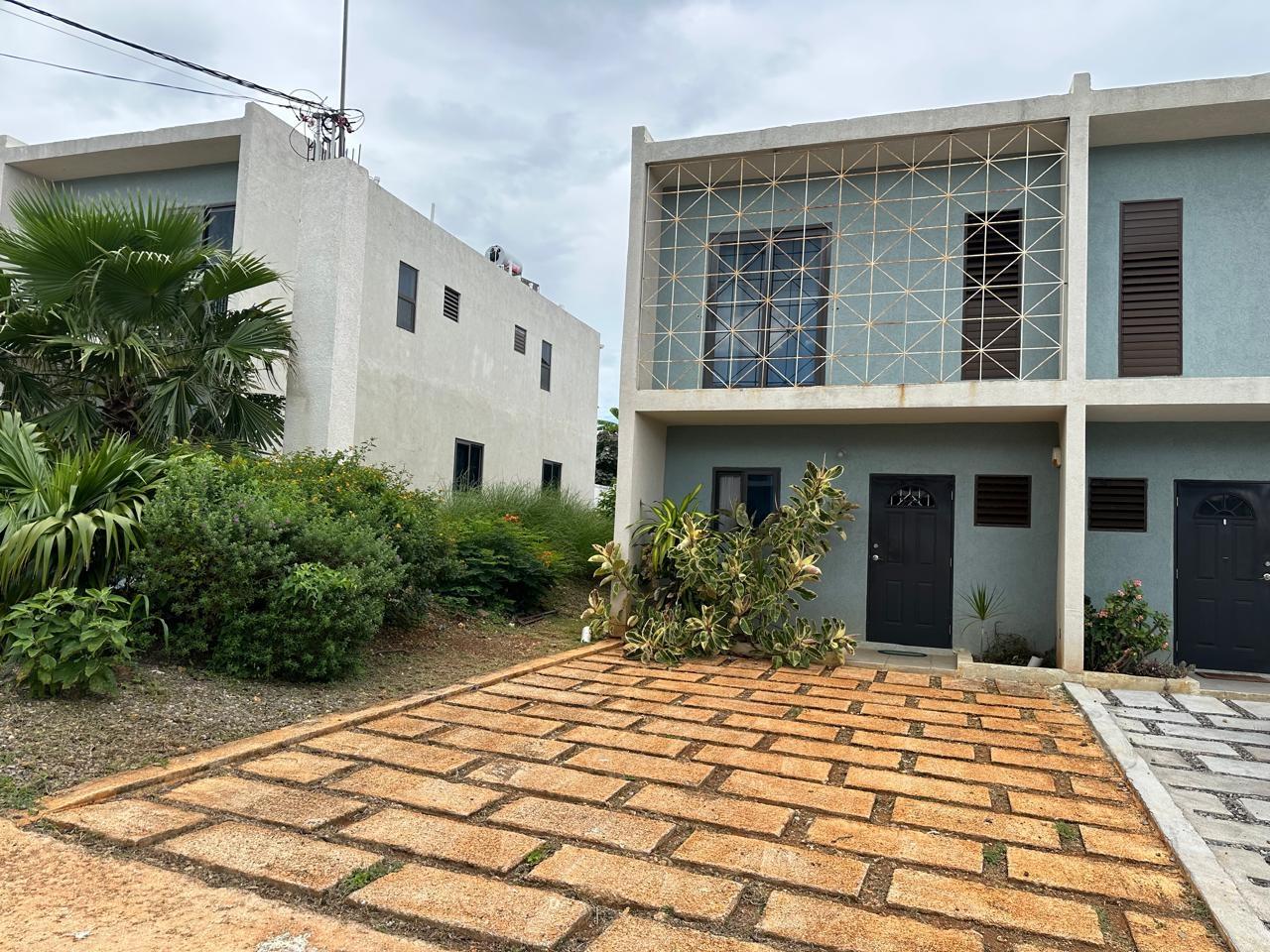 Furnished-2-Bedroom-Townhouse-for-Rent-in-Discovery-Bay-St.-Ann-Camelot-Village Second image of 32 Camelot Village in Discovery Bay, St. Ann, Jamaica - property is For Rent