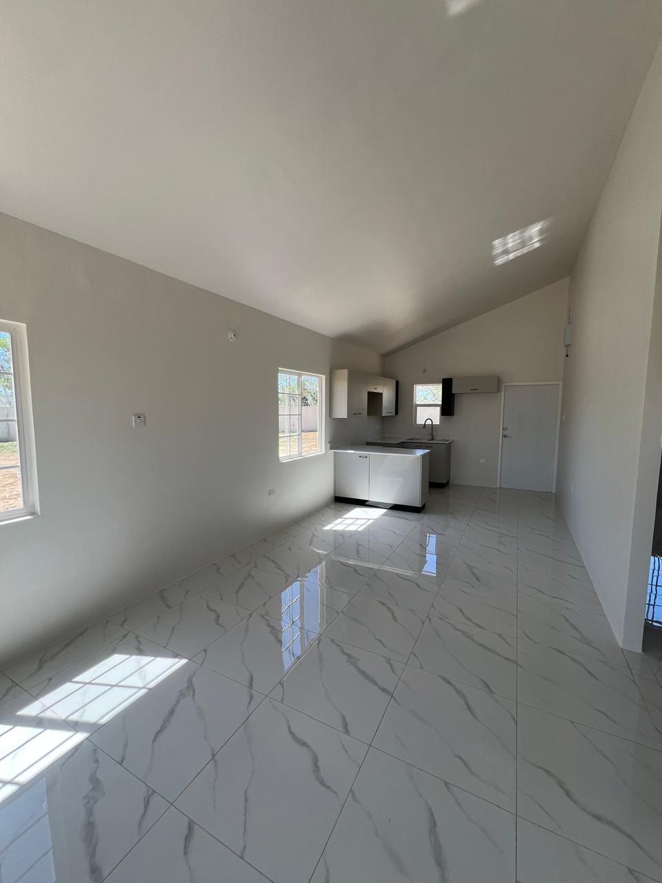 Modern-2-Bedroom-House-for-Rent-in-Phoenix-Park-Village-2-St.-Catherine-Jamaica First image of Lot 1005- Pheonix Park Village 2 ph in Phoenix Park, St. Catherine, Jamaica - property is For Rent