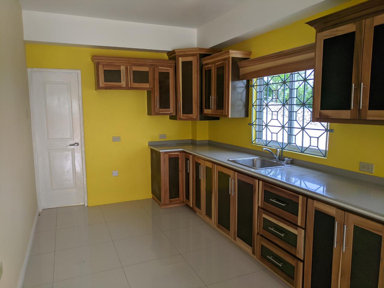 Spacious-2-Bedroom-Apartment-for-Rent-in-St.-Andrew-Jamaica-City-Views-Quiet-Living Seventh image of 2-19 Cleopatra Avenue in Kingston 19, St. Andrew, Jamaica - property is For Rent