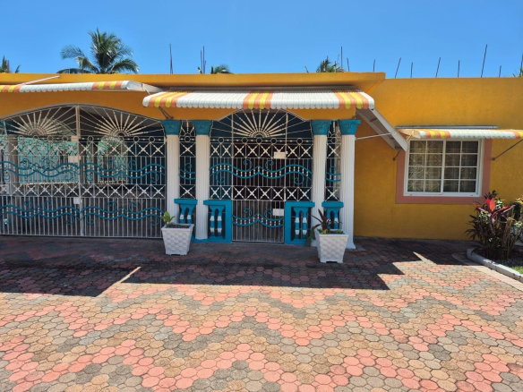 First image of 112 Hartwell Gardens in May Pen, Clarendon, Jamaica - property is For Sale