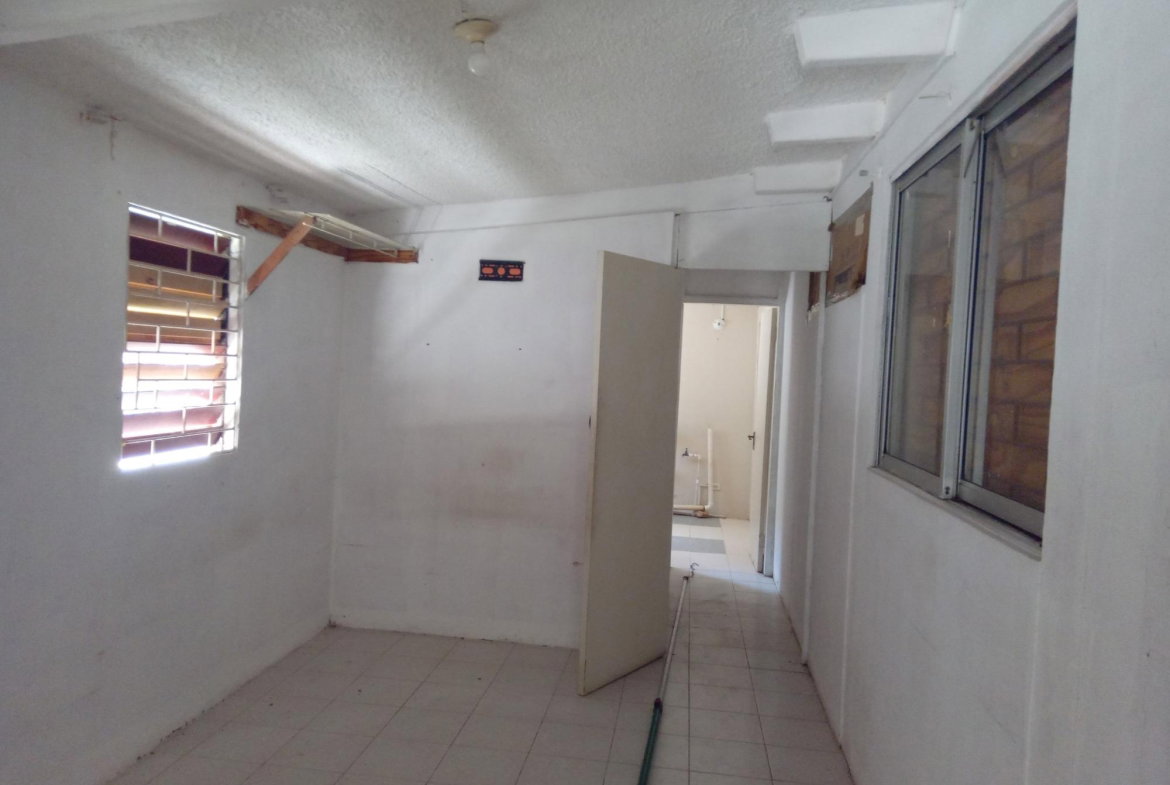 Fifth image of 14 East Great House Circle in Kingston 19, St. Andrew, Jamaica - property is For Sale