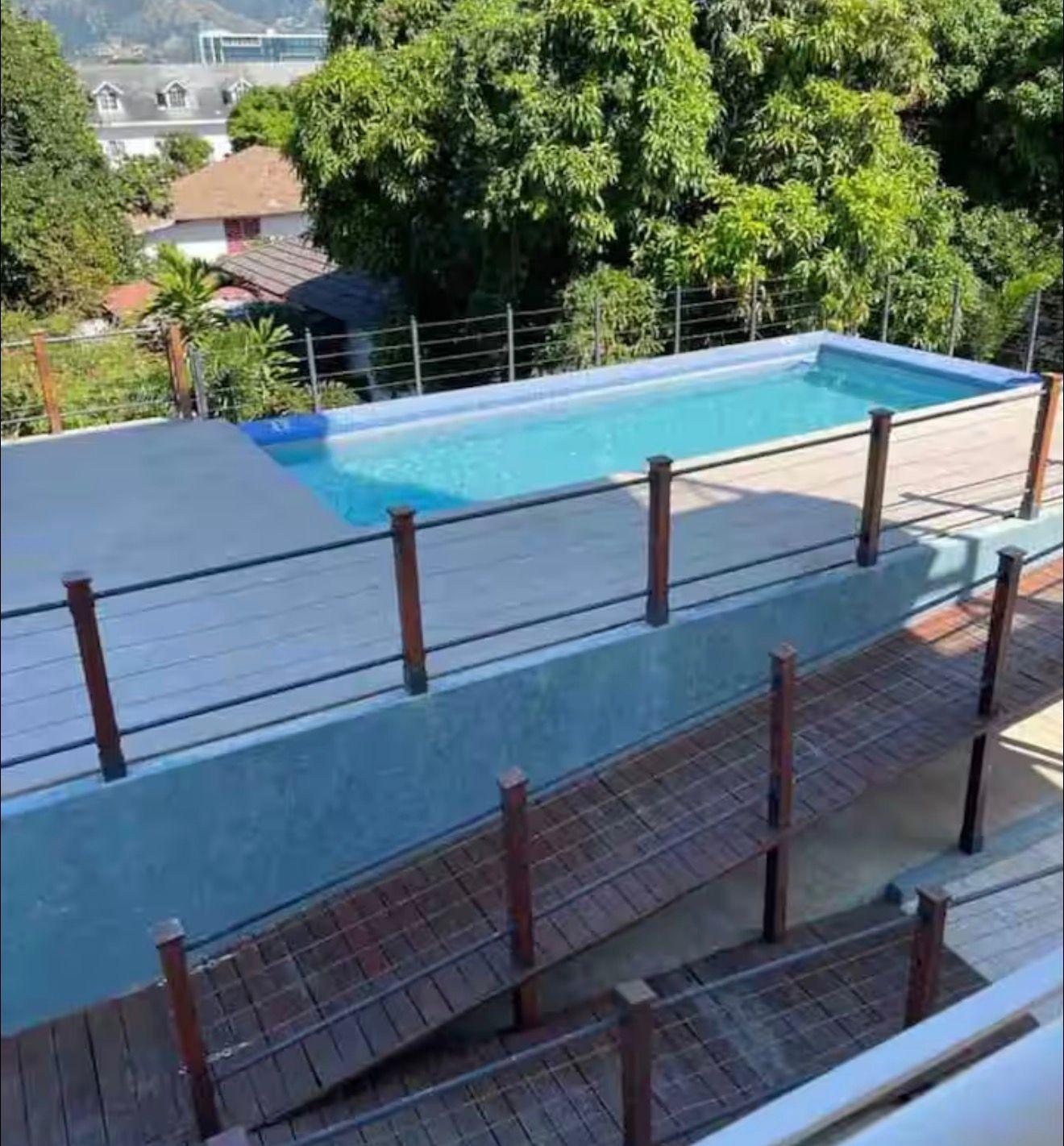 Turnkey-Airbnb-Penthouse-for-Sale-in-Kingston-–-Proven-Income-Fully-Furnished Sixteenth image of Apt 48-6 Brompton Road in KINGSTON, Kingston, Jamaica - property is For Sale