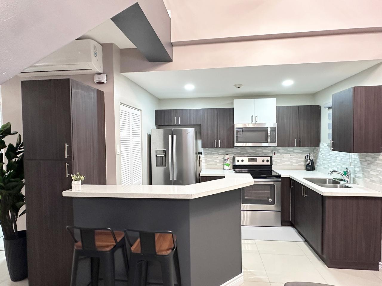 Turnkey-Airbnb-Penthouse-for-Sale-in-Kingston-–-Proven-Income-Fully-Furnished Sixth image of Apt 48-6 Brompton Road in KINGSTON, Kingston, Jamaica - property is For Sale