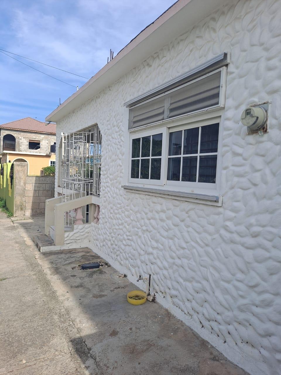 Charming-2-Bed-2-Bath-House-For-Sale-in-Monza-Portmore-St.-Catherine Second image of 384 North 28th Way Monza in Monza, St. Catherine, Jamaica - property is For Sale