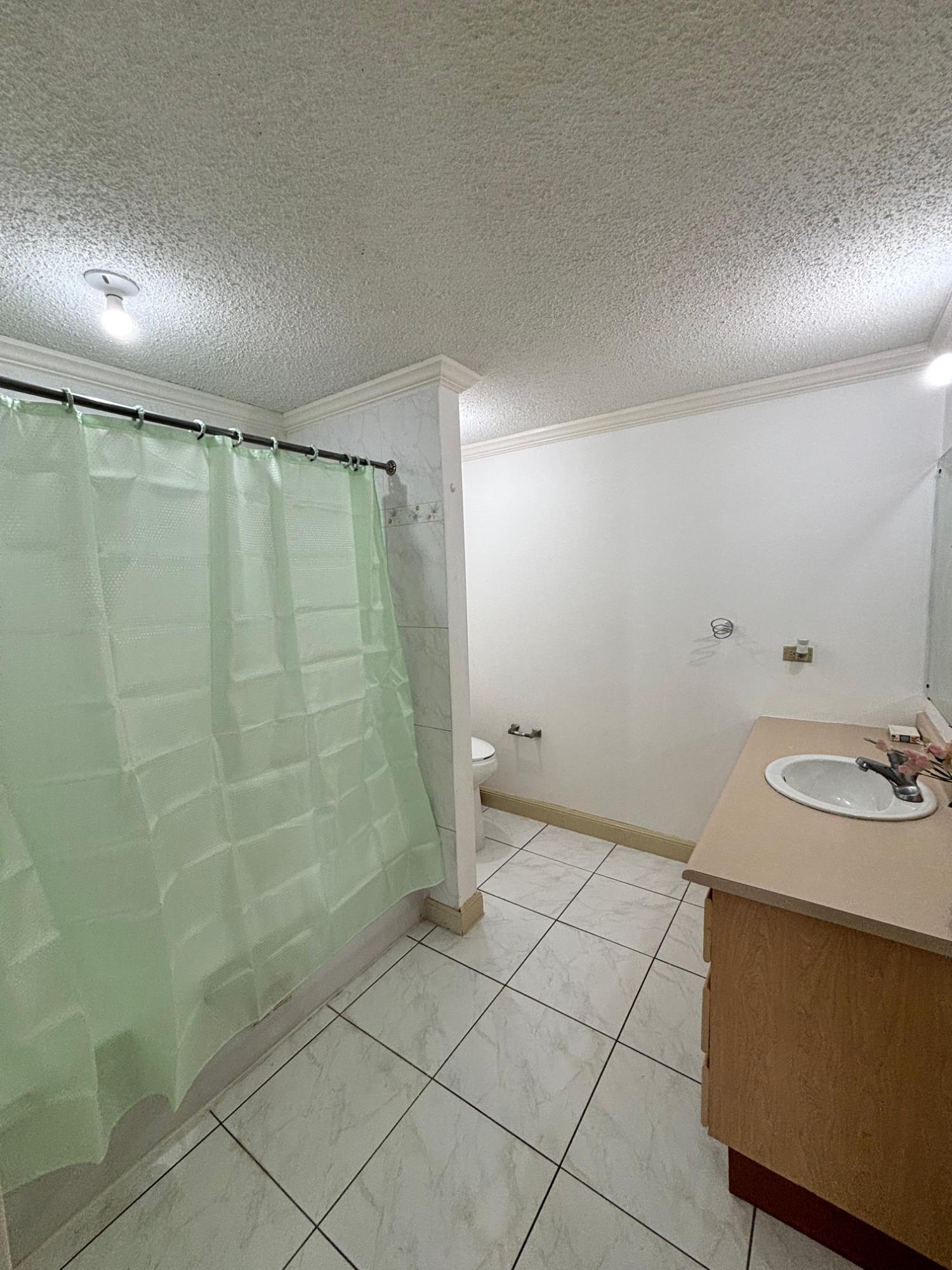 Charming-3-Bedroom-Townhouse-for-Rent-in-Mango-Walk-Country-Club-Montego-Bay Fifteenth image of 6 Agave Close, Mango Walk c in Mango Walk C-Club, St. James, Jamaica - property is For Rent