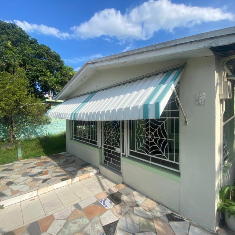 First image of 9 Woodpecker Avenue in Kingston 11, St. Andrew, Jamaica - property is For Sale