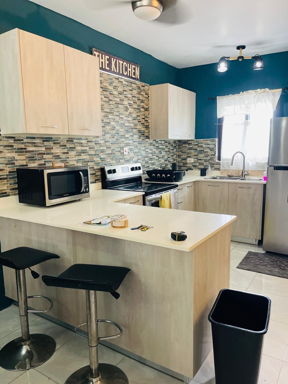 Fully-Furnished-2-Bed-Townhome-in-Camelot-Village-1-St.-Ann-Jamaica-Investment-or-Residence Second image of 67 Seville Drive, Camelot in Discovery Bay, St. Ann, Jamaica - property is For Sale