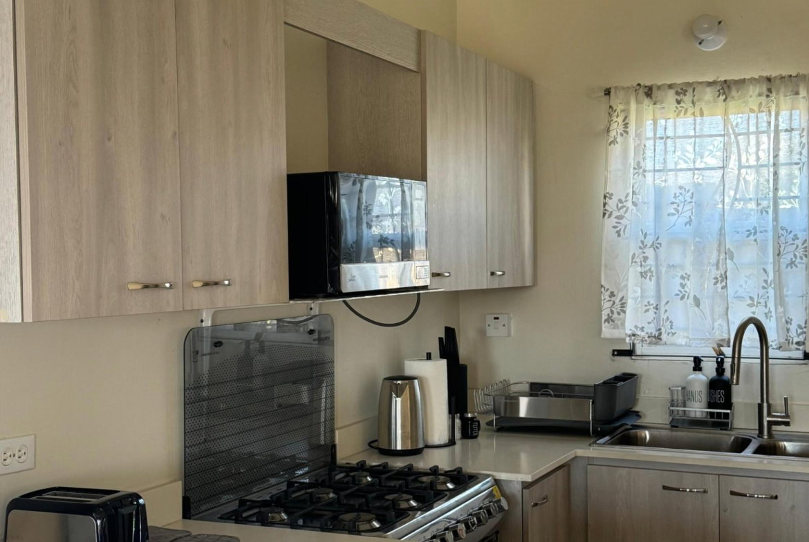 Fifth image of 1687 Seaside Circle, Phoenix v in Bernard Lodge, St. Catherine, Jamaica - property is For Rent