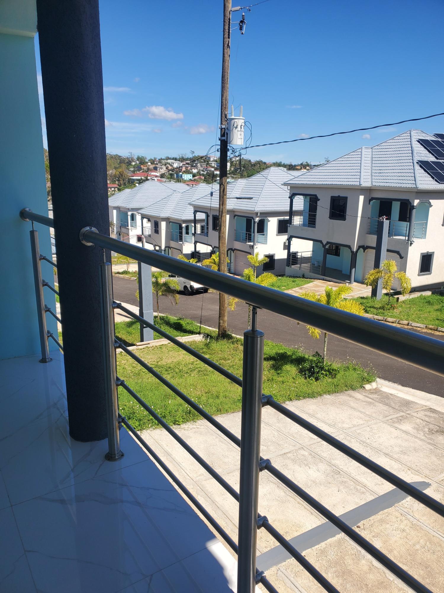 Luxury-3-Bed-Townhouse-for-Sale-in-Gated-Areca-Palm-Estate-Mandeville First image of 4-62 Ward Avenue in Mandeville, Manchester, Jamaica - property is For Sale