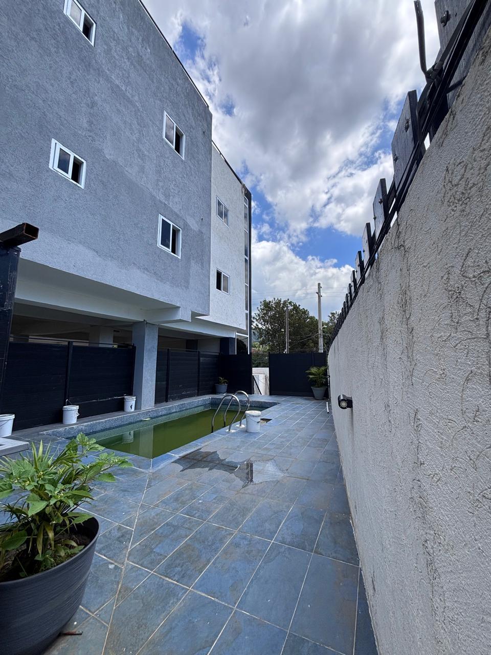 Fifth image of 08-18 Acadia Drive, Kingston 8 in Kingston 6, St. Andrew, Jamaica - property is For Sale