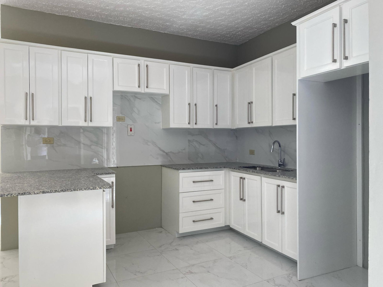 Modern-2-Bedroom-Apartment-for-Sale-in-St.-Andrew-Jamaica-Panoramic-Views-Prime-Location Second image of 8-17a Elmwood Terrace in Kingston 19, St. Andrew, Jamaica - property is For Sale