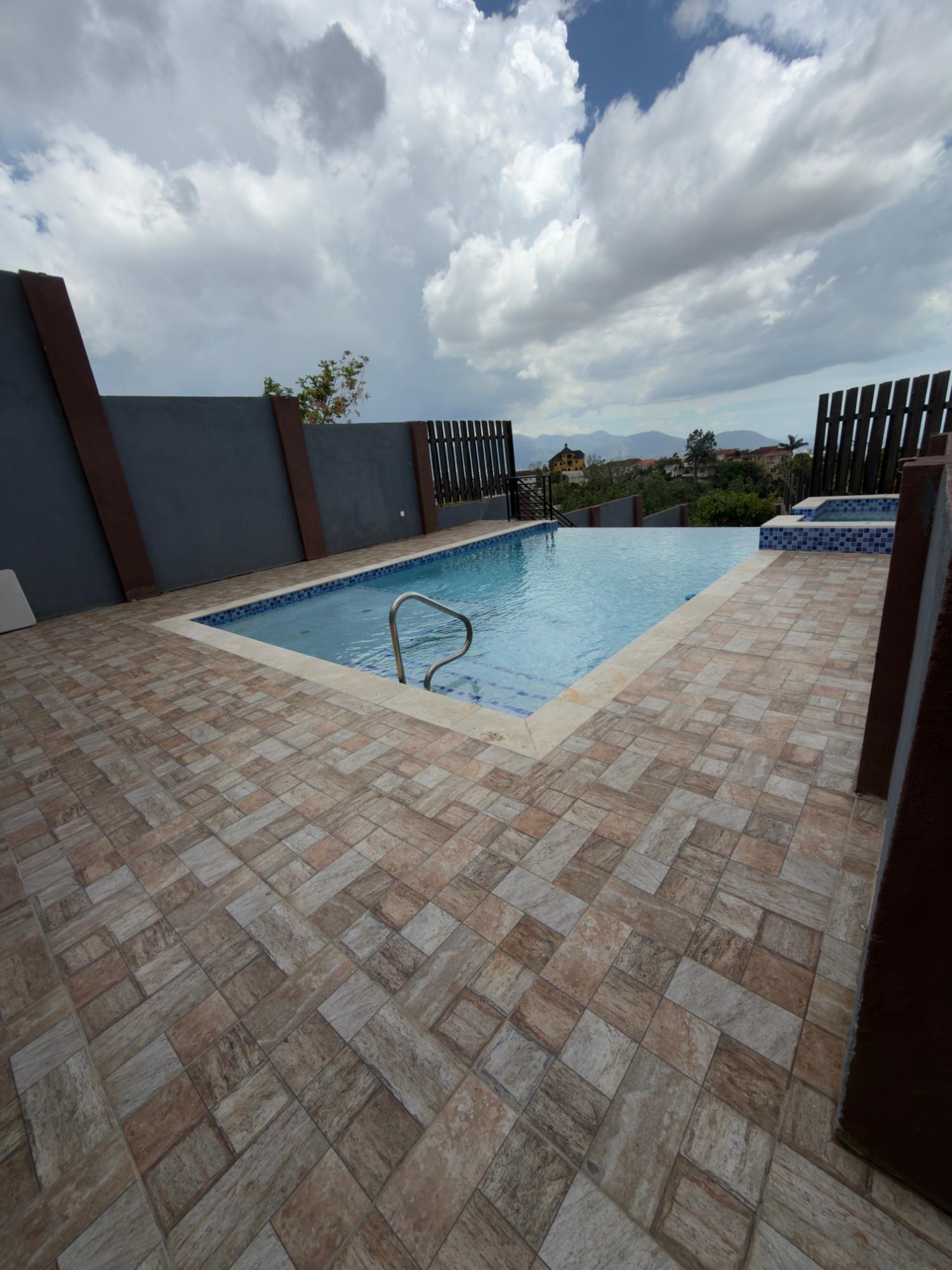 Penthouse-For-Sale-in-St.-Andrew-Jamaica-3-Bed-3.5-Bath-with-360°-Views-Rooftop-Terrace Eleventh image of 6-63 Opal Avenue in Red Hills, St. Andrew, Jamaica - property is For Sale