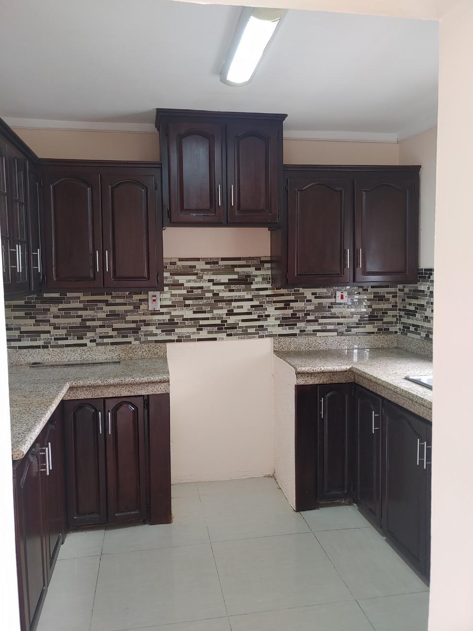 Spacious-2-Storey-Apartment-for-Sale-at-Shannon-Court-St.-Andrew-Jamaica First image of 19-54 Shortwood Road in Kingston 8, St. Andrew, Jamaica - property is For Sale