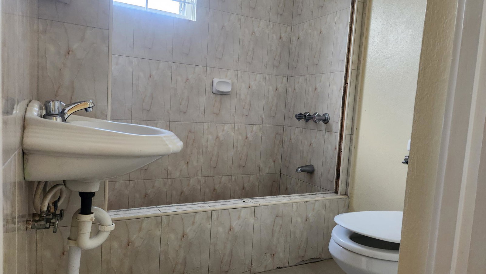 Spacious-3-Bedroom-Apartment-for-Sale-Near-University-of-Technology-Kingston-Jamaica Fourteenth image of 4-31 University Crescent, King in Kingston 6, St. Andrew, Jamaica - property is For Sale