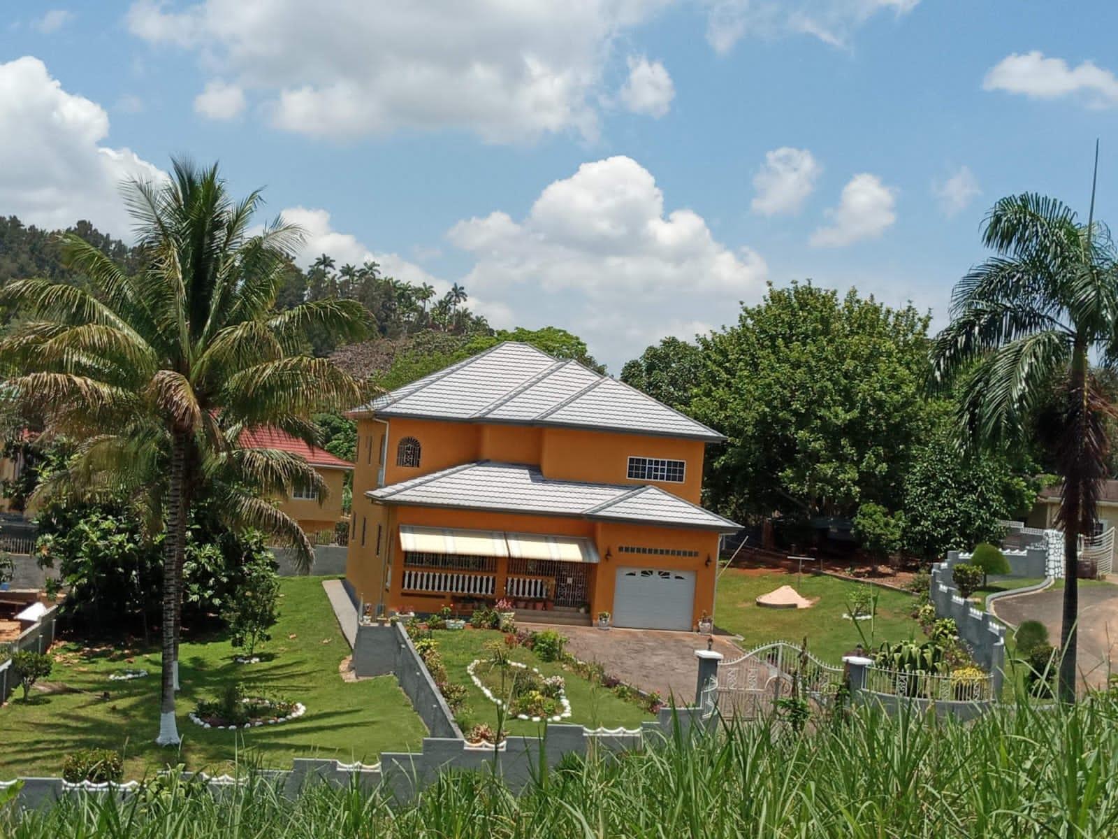 Spacious-5-Bedroom-House-for-Sale-in-Mandeville-Manchester-Jamaica First image of Clover Wood Way, Mandevil in Caledonia Meadows, Manchester, Jamaica - property is For Sale