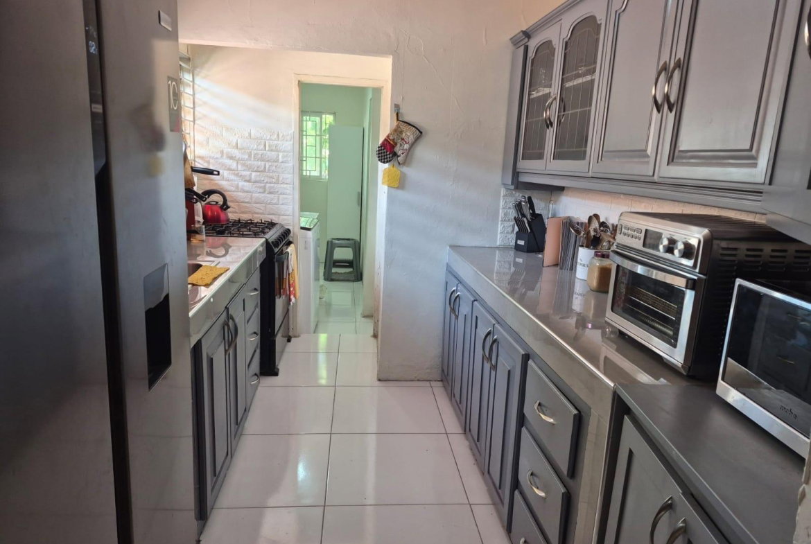 Seventh image of 156 Ridgeway Road, Meadowbroo in Kingston 19, St. Andrew, Jamaica - property is For Sale