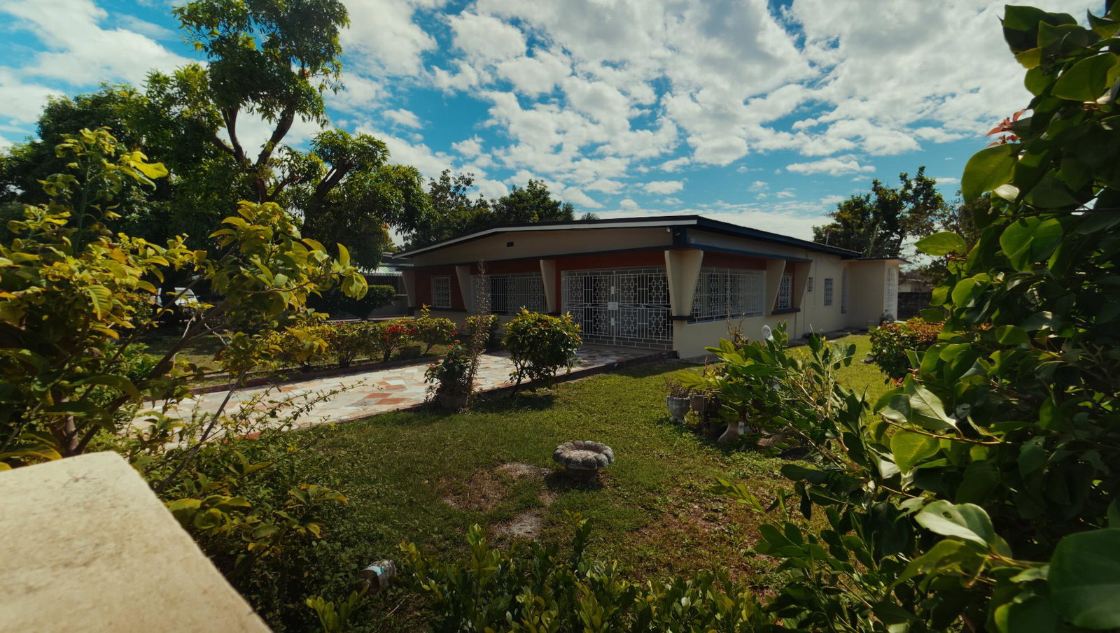 Spacious-5-Bedroom-House-for-Sale-in-Prime-St.-Andrew-Jamaica First image of 23 Woodlawn Avenue, Queensbu in Kingston 19, St. Andrew, Jamaica - property is For Sale