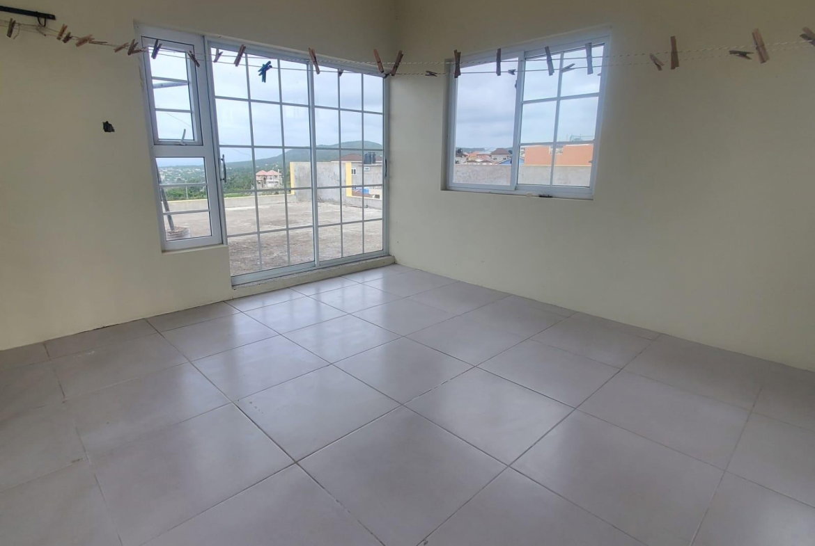 Twenty-Third image of Apt C-721 Birch st Rhyne Park in SPOT VALLEY, St. James, Jamaica - property is For Rent